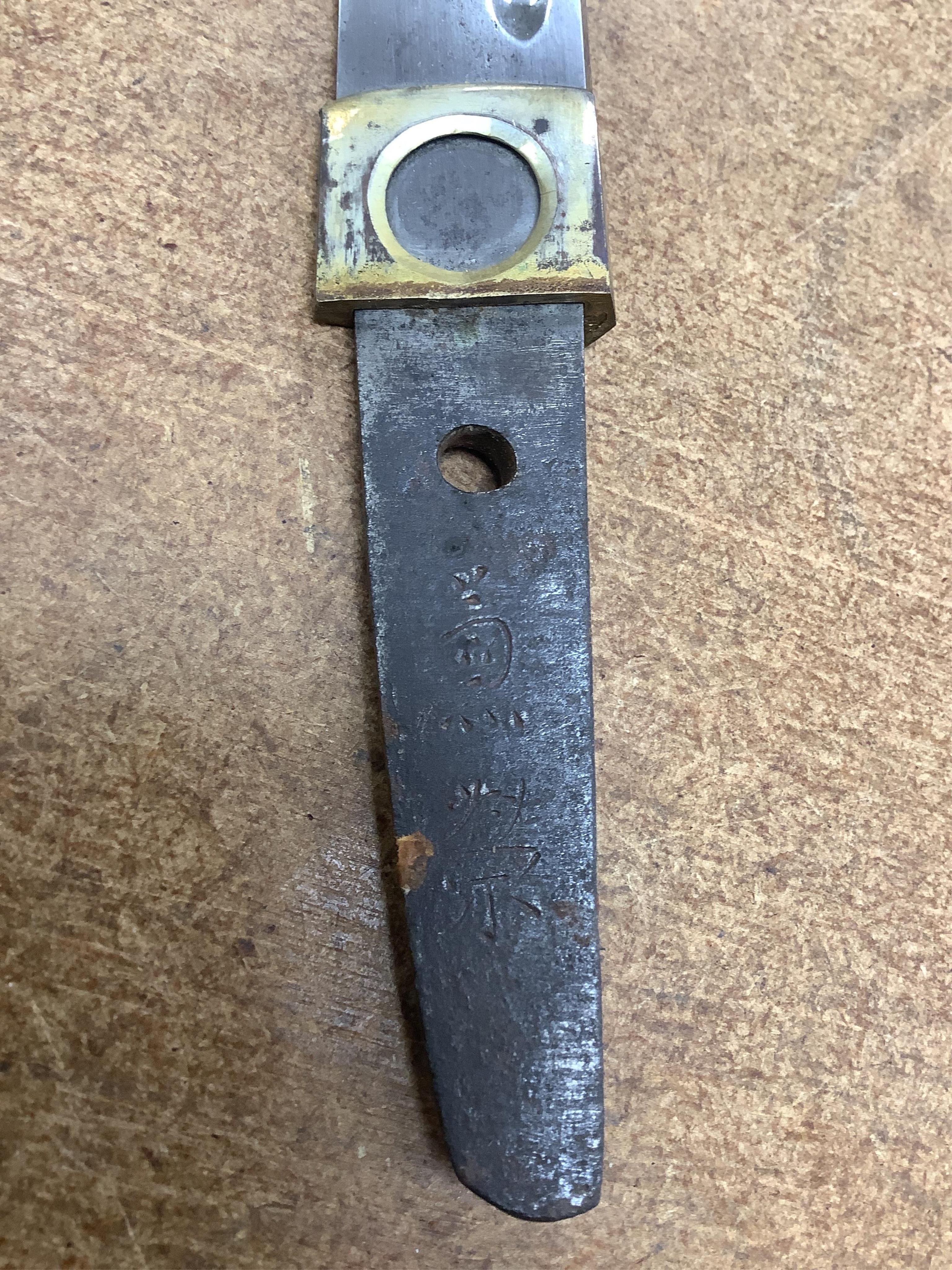 A Japanese knife in lacquered sheath and a handle, largest 34cm in length. Condition - fair to good